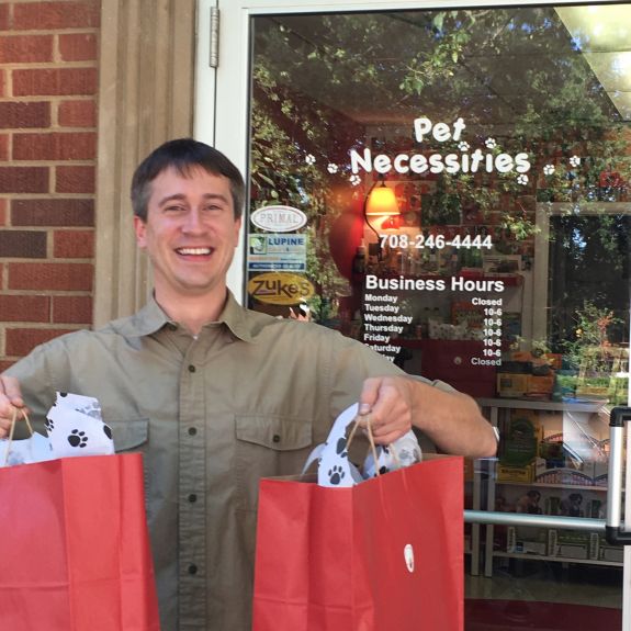 Andrew from Pet Necessities, with awesome goodies for Team Tripawds. Photo: Christine Castellano.